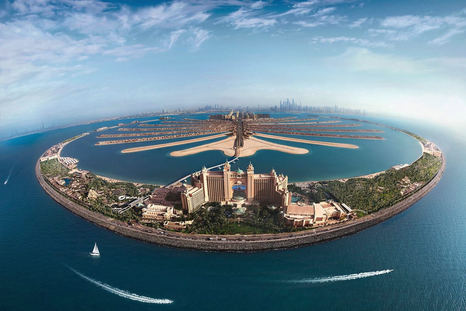 Palm Jumeirah from the air, its fronds reaching into the Gulf